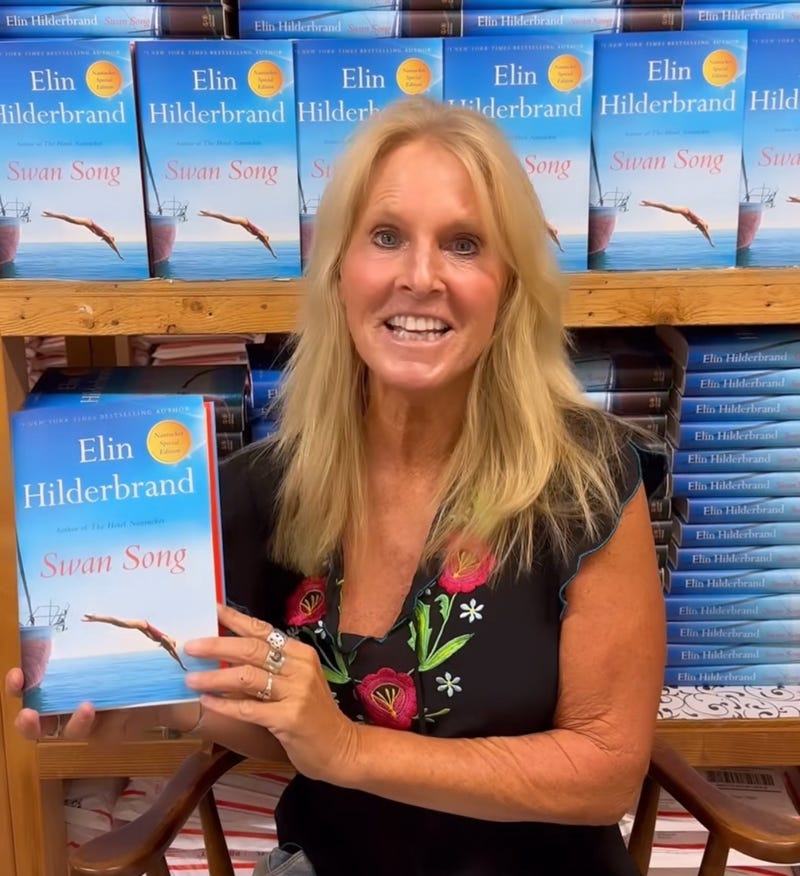 Elin Hilderbrand holds her final Nantucket based novel, Swan Song at her beloved local Nantucket Book Partners which includes Mitchell's Book Corner and Nantucket Bookworks.