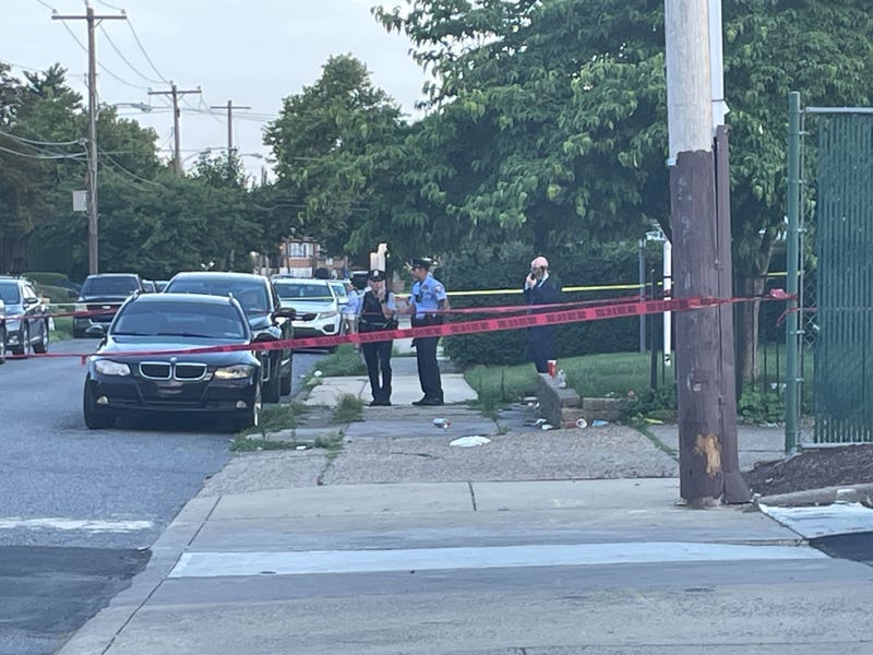 Police cordon off the scene on Meridian Street in Holmesburg where a 7-month-old boy was shot in the leg.