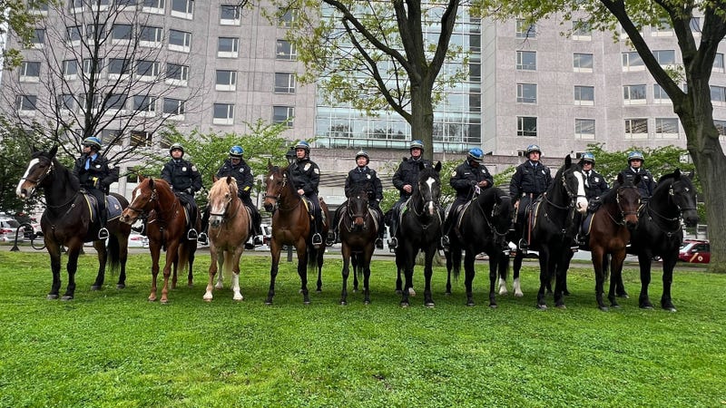 Police on horseback at a memorial for fallen first responders in Philadelphia.