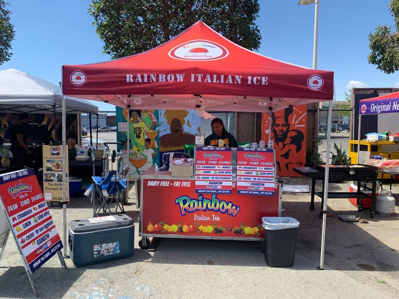 Rainbow Italian ice vendor featured at Liberation Park's 420 Festival.
