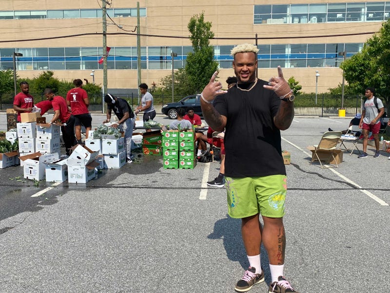 Buffalo Bills offensive tackle Dion Dawkins at the drive-thru food pantry he organized on the campus of his alma mater, Temple University.