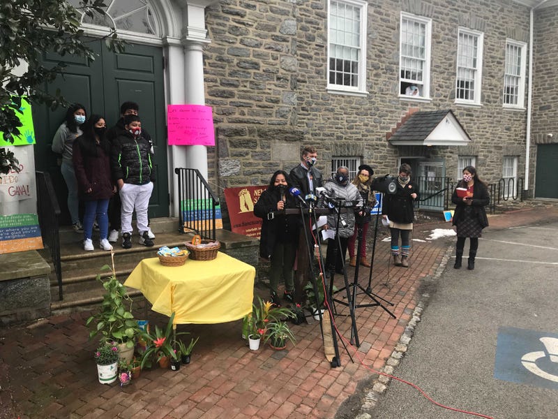 Carmela Apolonia Hernández speaks in front of the Germantown Menonite Church