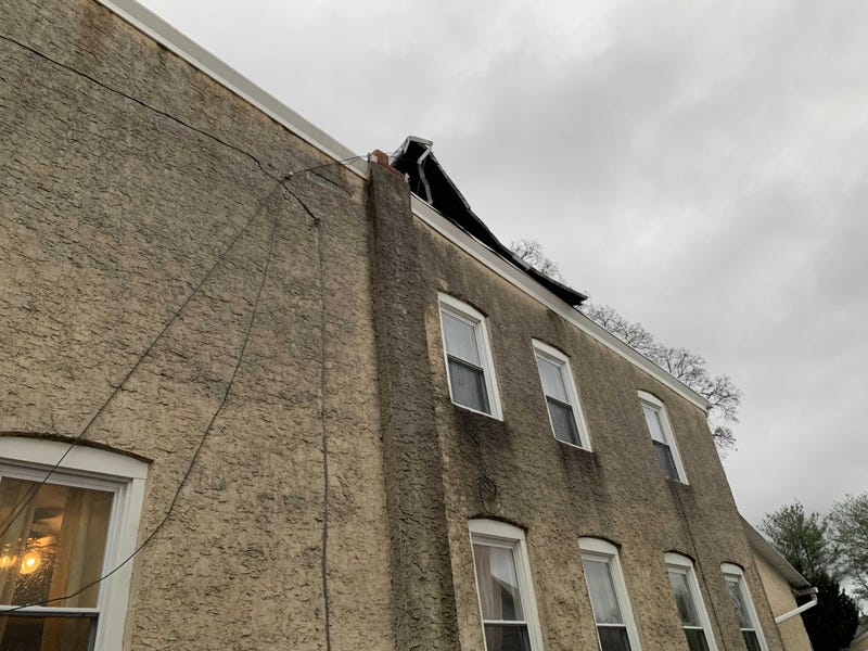 A section of roof on this house was badly damaged in Thursday night's storms.
