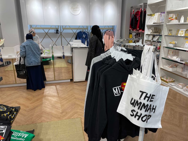 Sharif’s husband, Musa, known as “Moses the Comic” on Instagram, sells his novelty tees and sweatshirts at the shop as well.