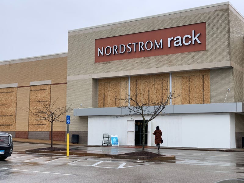 Nordstrom boards up their storefront before election night.