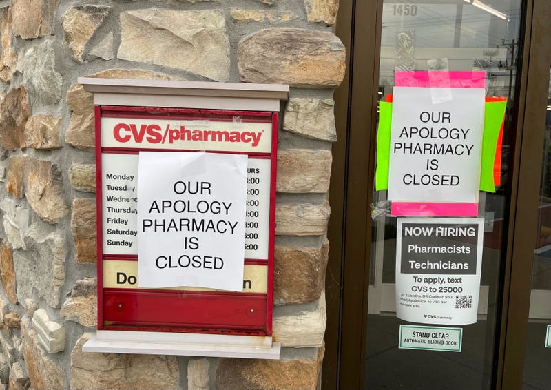 Signs about low staffing at a pharmacy in Chester County.