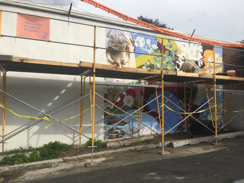A new mural is in progress in Germantown, at the corner of Queen Lane and Greene Street, honoring caregivers and residents at Einstein's Long Term Structured Residence.