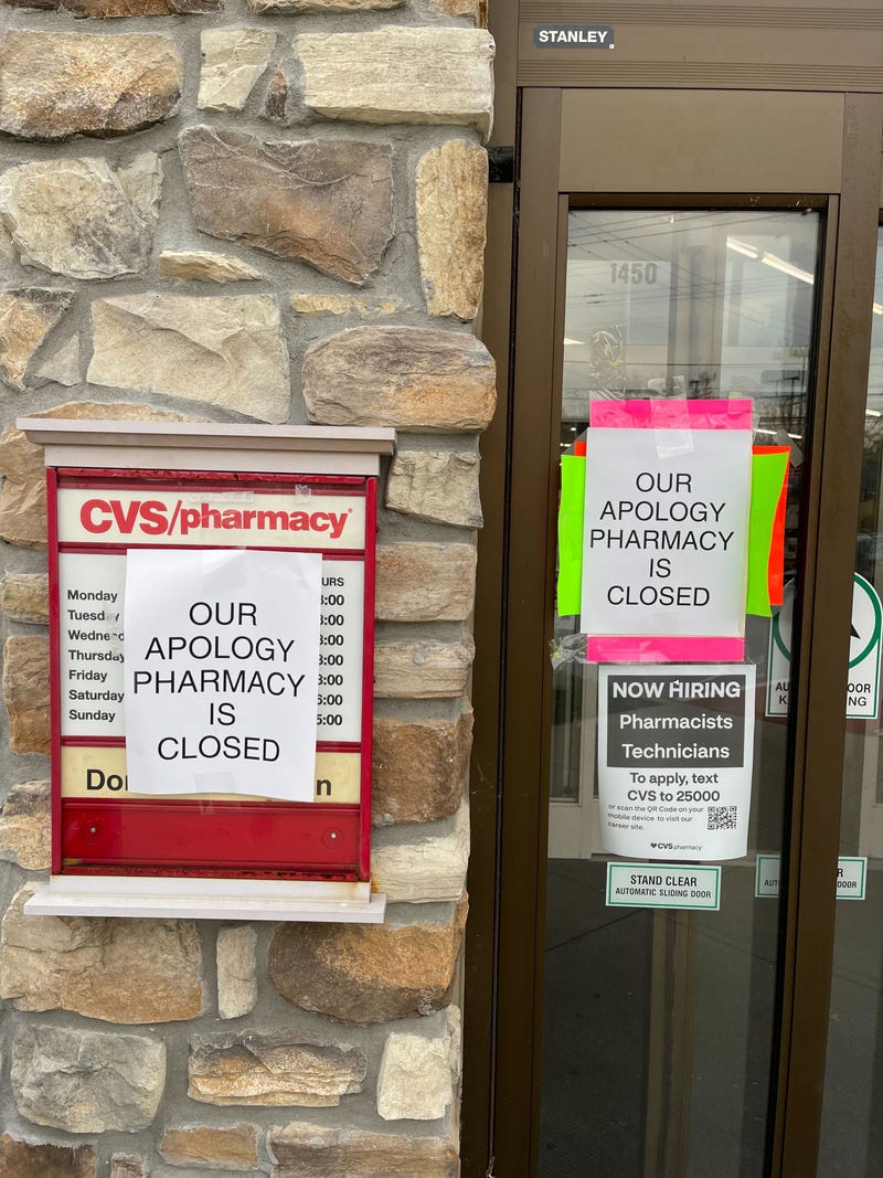 Signs about low staffing at a pharmacy in the Philadelphia area.