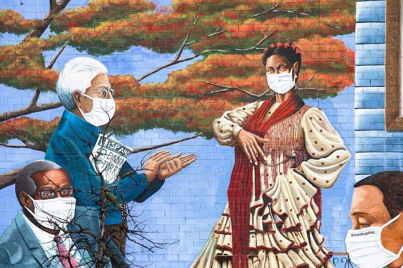 Mural Arts Philadelphia has painted masks on murals