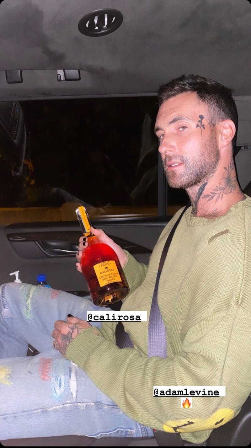 Adam Levine face tattoo