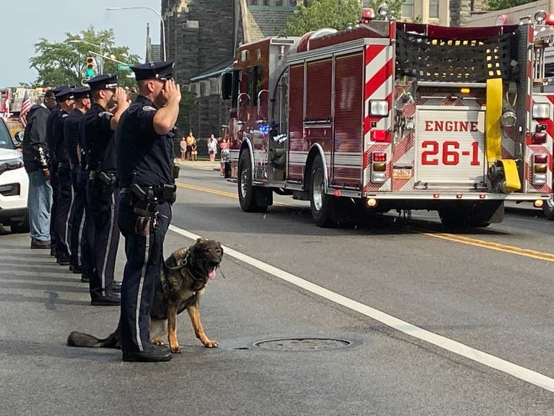 A procession to honor fallen firefighter Tom Royds.