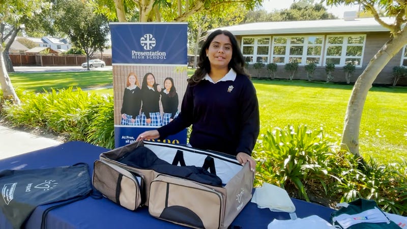 Nishi Dharia is seen at Pleasanton High School displaying her self-designed incubator that may be used by doctors in India.
