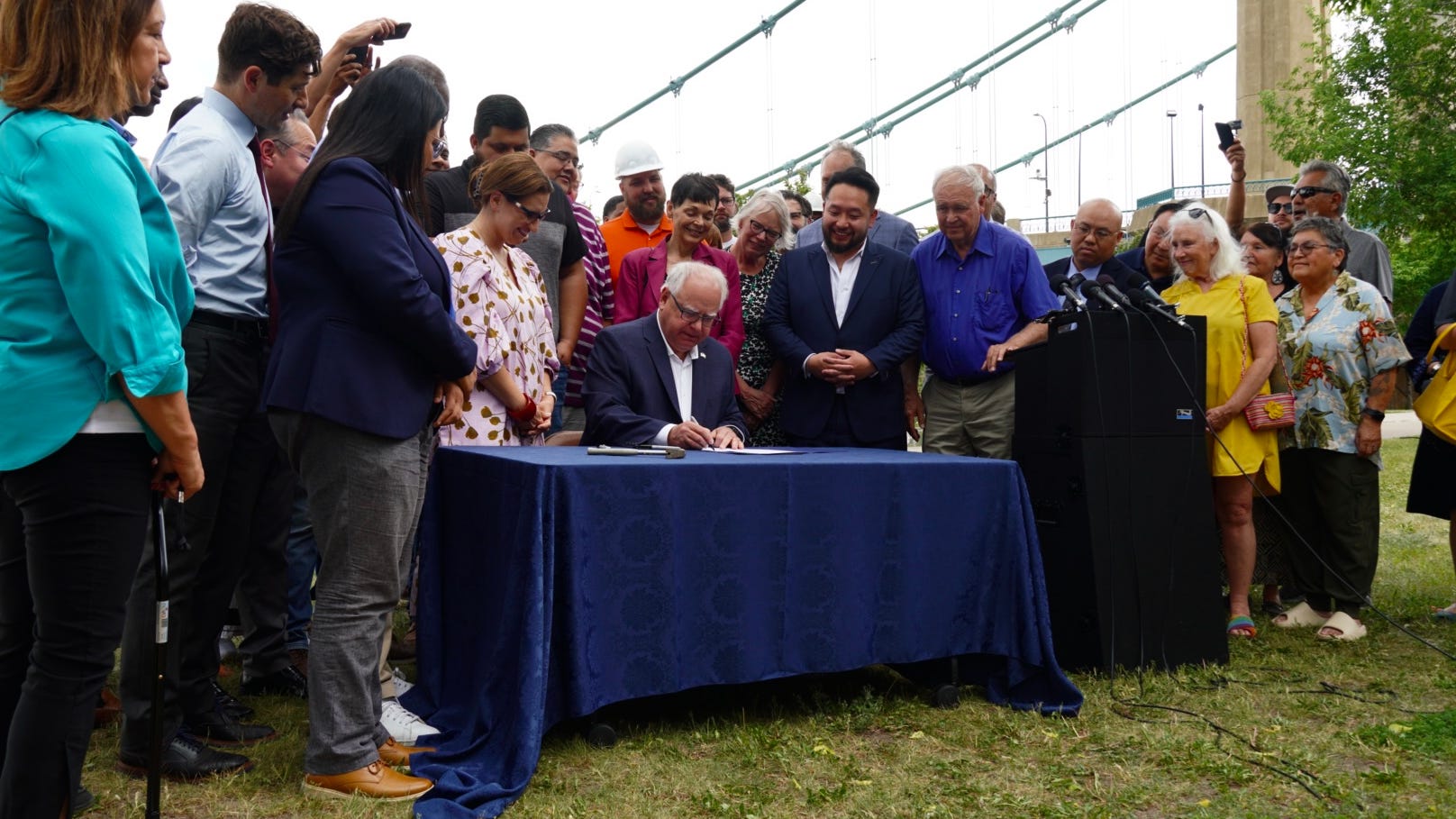 Governor Walz signs a $2.6 billion infrastructure bill into law