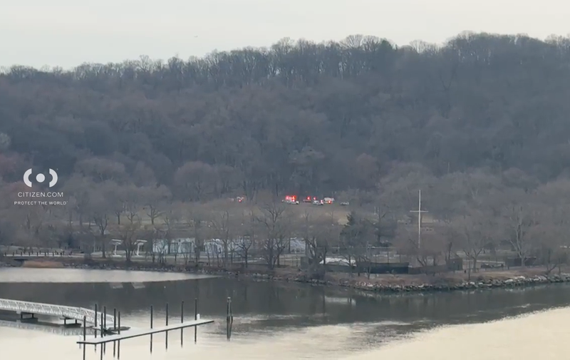 Police are seen at Inwood Hill Park on March 23 after a woman was found dead there