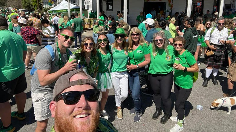 group celebrating St Patrick's Day at block party