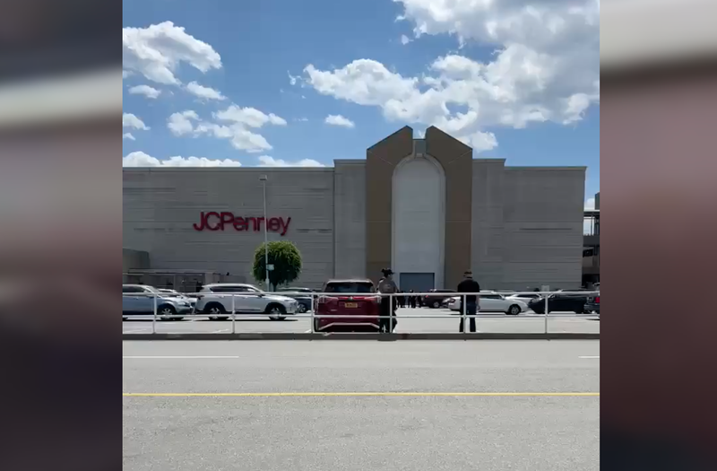 People flee the JCPenney at the Bay Plaza Mall in the Bronx after patrons mistake fireworks for gunshots.