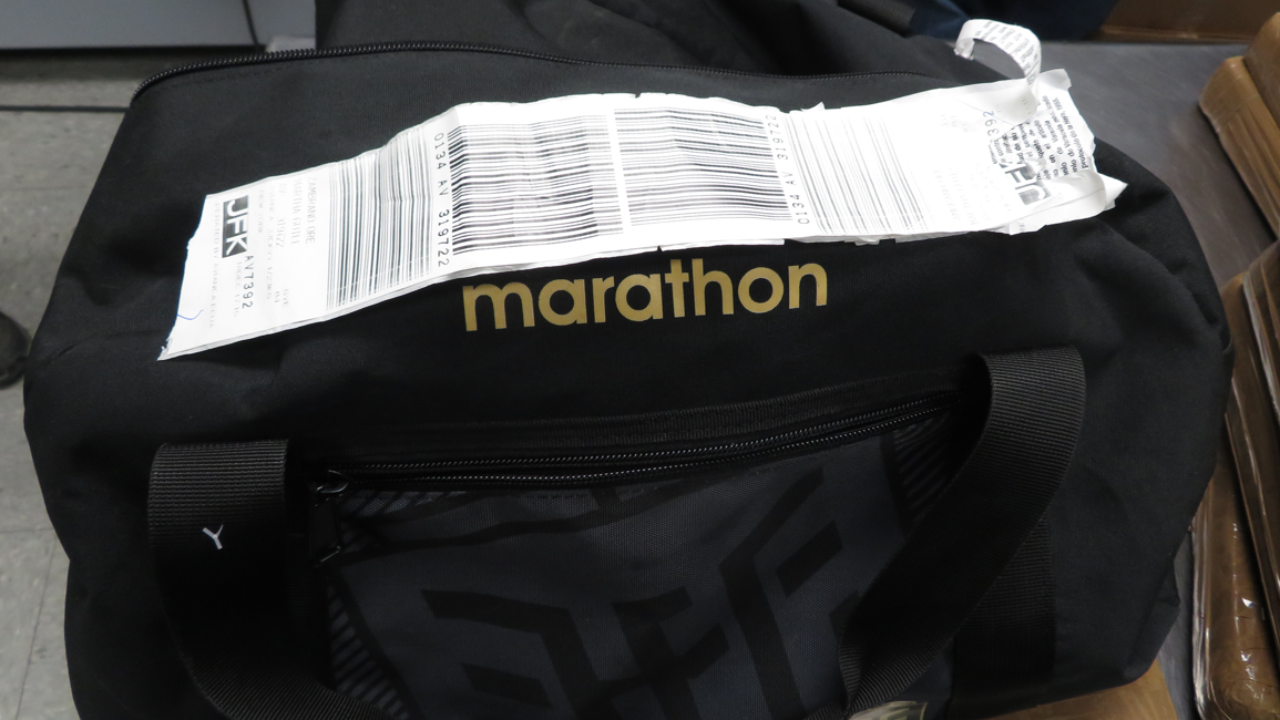 PHOTOS: 24 pounds of cocaine found inside duffel bag left on flight that landed at JFK
