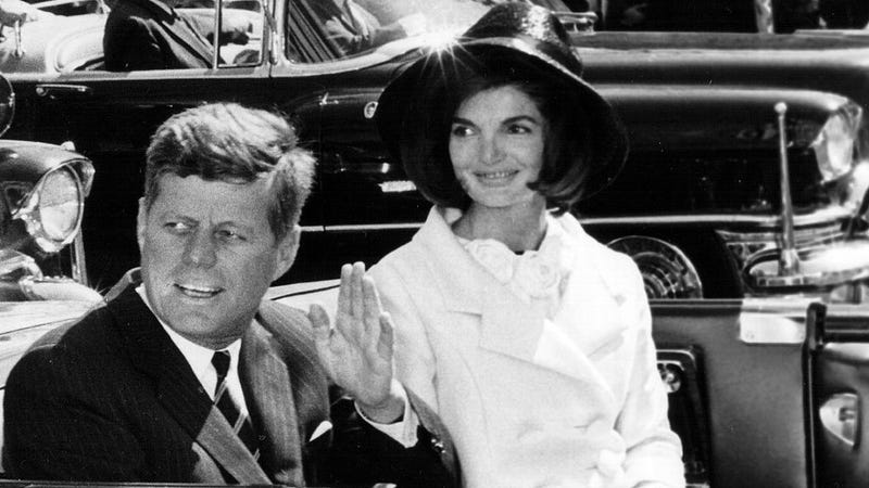 The President and Mrs. Kennedy ride in a parade March 27, 1963 in Washington.