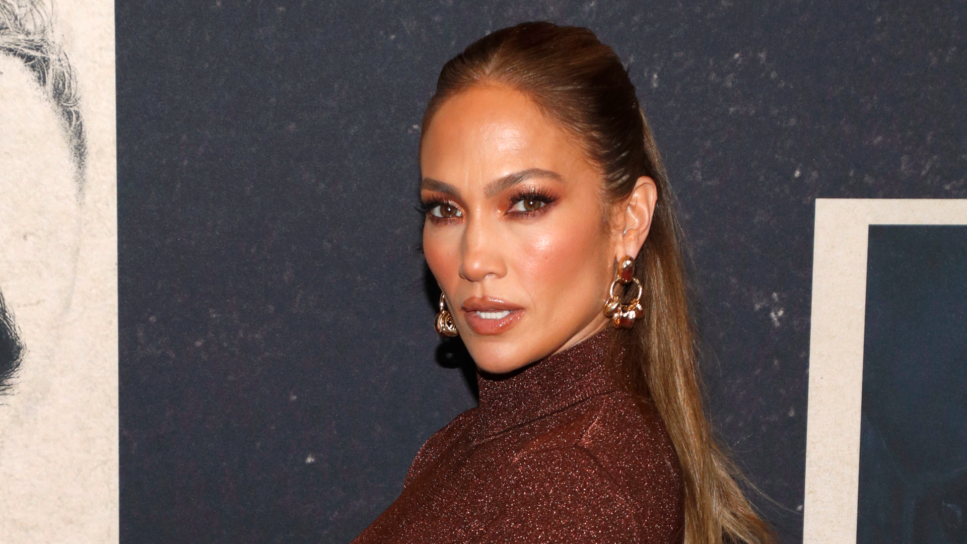 Let's talk about Jennifer Lopez in that sexy plunging jumpsuit on the cover of 'Rolling Stone'