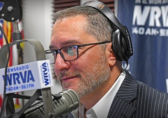 John Reid behind the mic