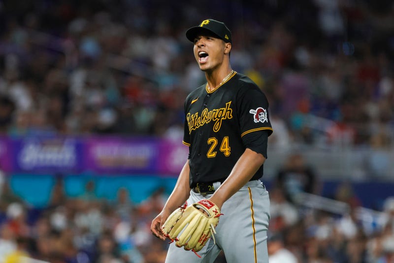 Pittsburgh Pirates starting pitcher Johan Oviedo (24) reacts against the Miami Marlins during the seventh inning at loanDepot Park.