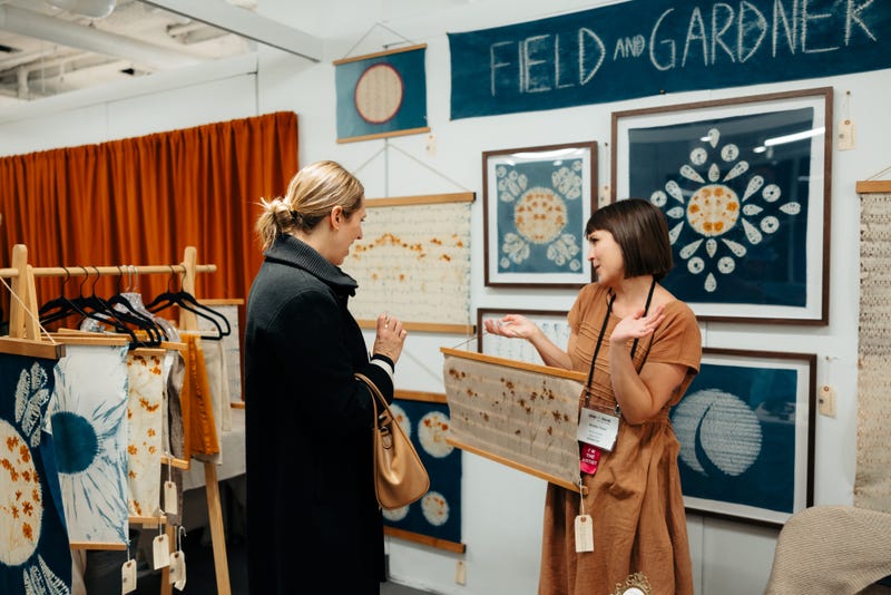 One of a Kind Show vendor and customer