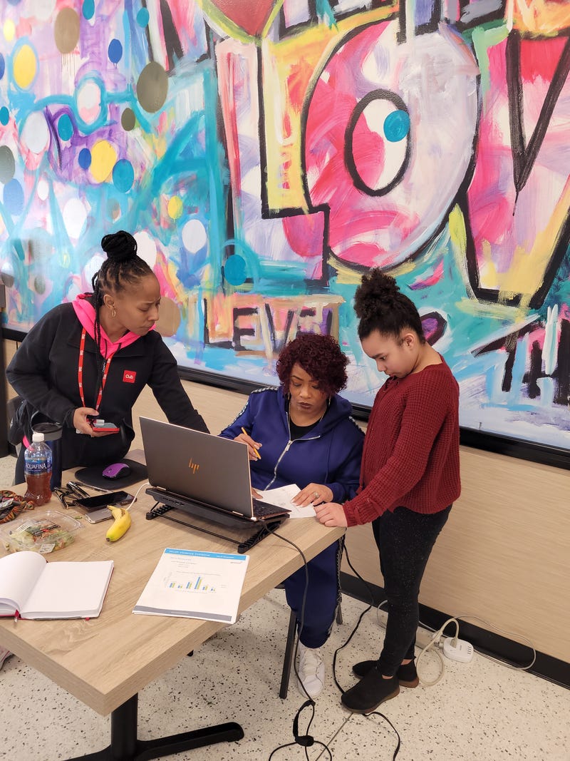 Student, Jacari Riggins receives math help from tutors at Northside Community Center