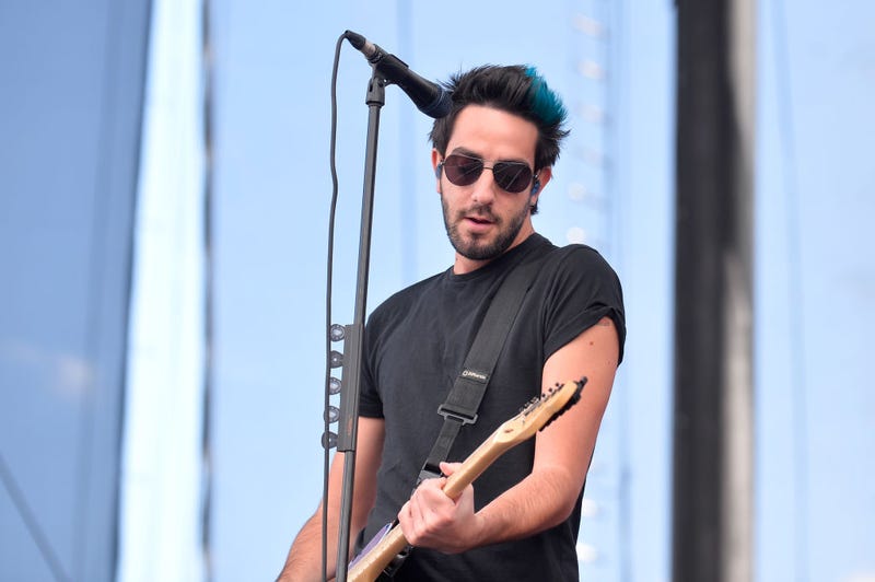 Jack Barakat of All Time Low performs onstage during the Daytime Village Presented by Capital One at the 2017 HeartRadio Music Festival at the Las Vegas Village on September 23, 2017 in Las Vegas, Nevada