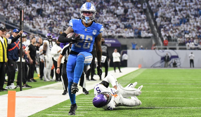 Lions running back Jahmyr Gibbs rushes for a touchdown in a win against the Vikings.
