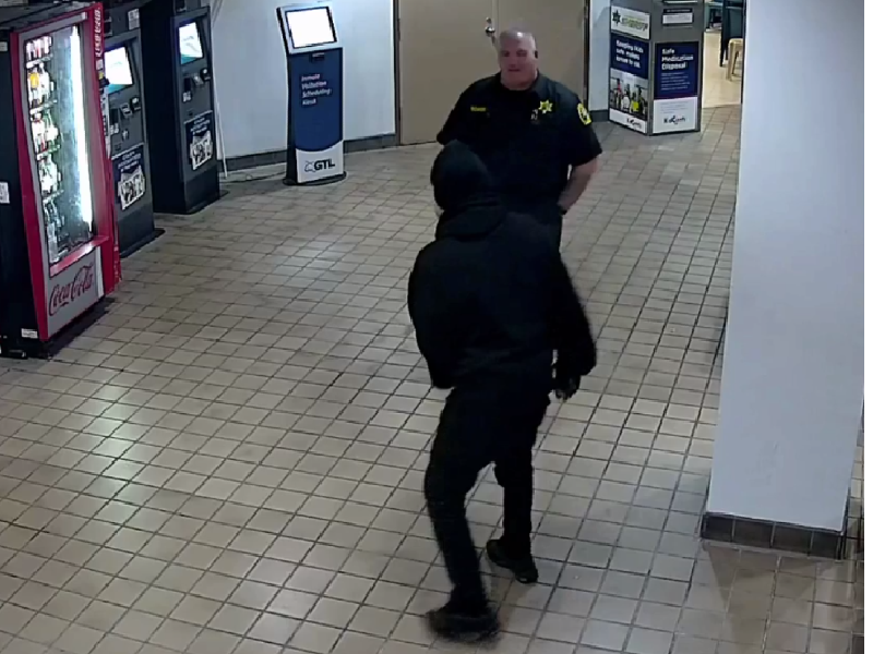 Terry Key getting ready to fight deputy inside jail lobby