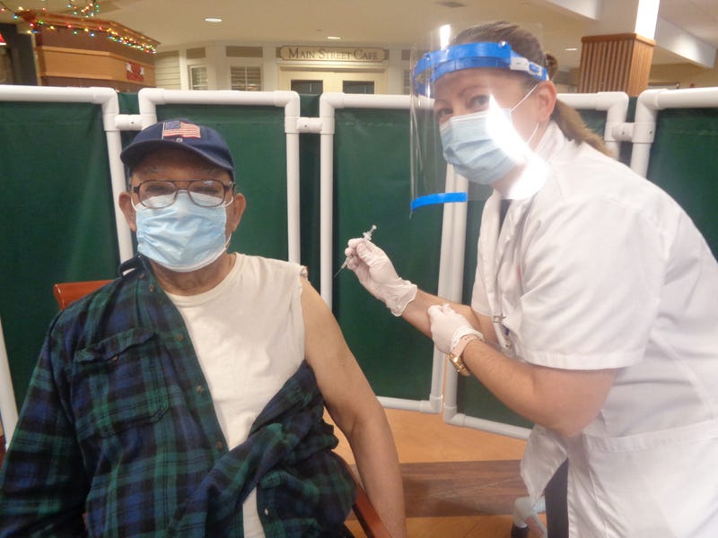 James Ingram received the first coronavirus vaccination administered at Sunny Hill Nursing Home of Will County by a Walgreens employee on Jan. 5. He was one of 158 people vaccinated at the facility.