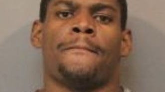 Man charged in fatal shooting of bank security guard in Gary; police searching for second suspect