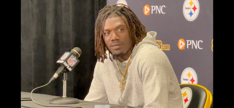 James Pierre at podium