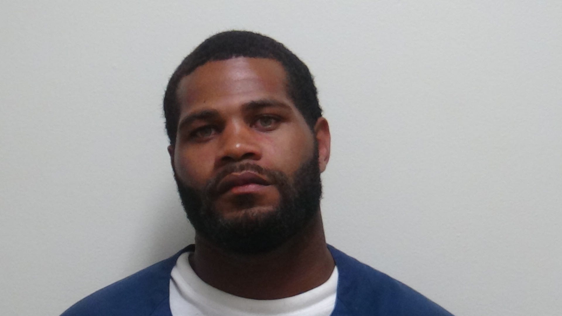 Convicted felon faces long list of charges after allegedly forcing man into Warren home at gunpoint, to steal car keys