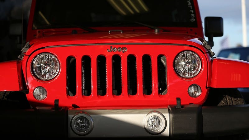 A Jeep Wrangler is displayed at the Hollywood Chrysler Jeep dealership on December 3, 2013 in Hollywood, Florida. 