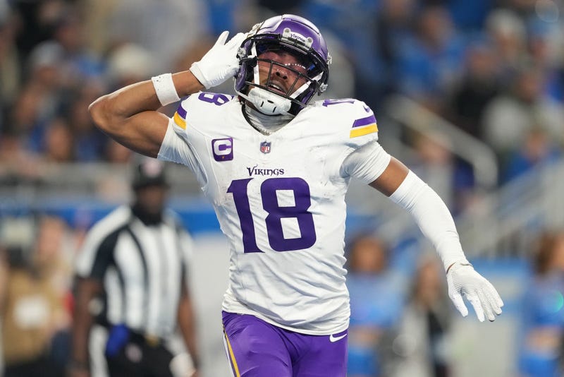 Justin Jefferson #18 of the Minnesota Vikings celebrates after a touchdown and is celebrating a massive new contract on Monday.