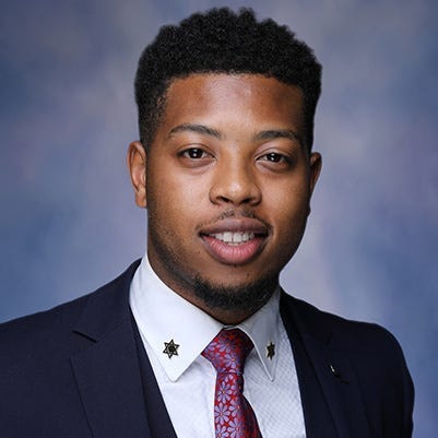 Jewell jones in blazer and tie 