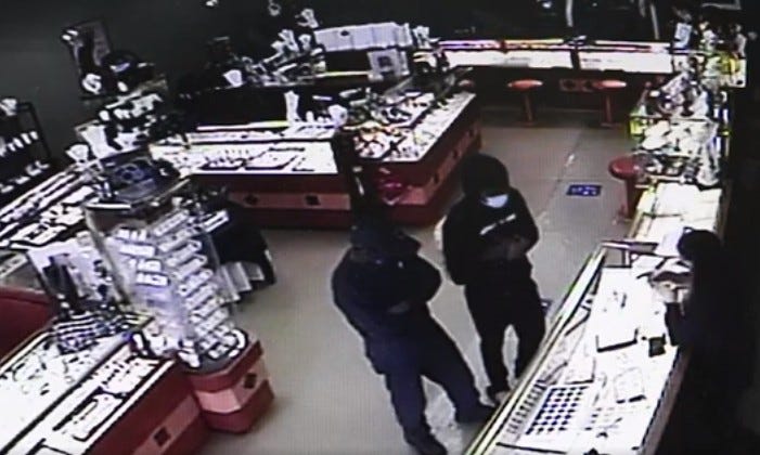 Police in Shelby Township are seeking tips to help catch two suspects who were caught on camera snatching several diamond rings from a jewelry store.