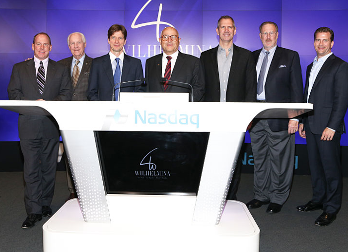 Jim Roddey seen second from the left, at the Wilhelmina International Inc. NASDAQ Ringing Of The Bell