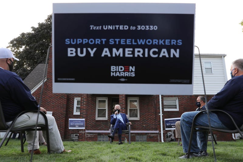 Joe Biden Campaigns in front of Steelworkers Sign