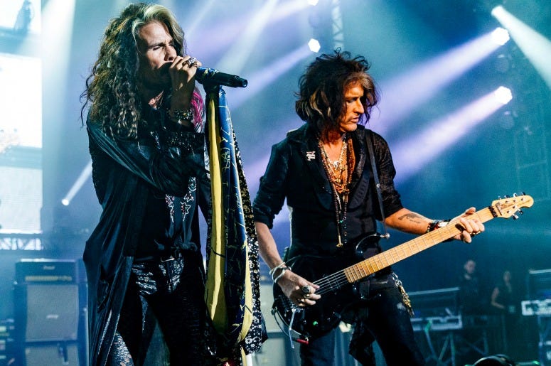 Steven Tyler and Joe Perry perform during Tyler's Second Annual GRAMMY Awards Viewing Party
