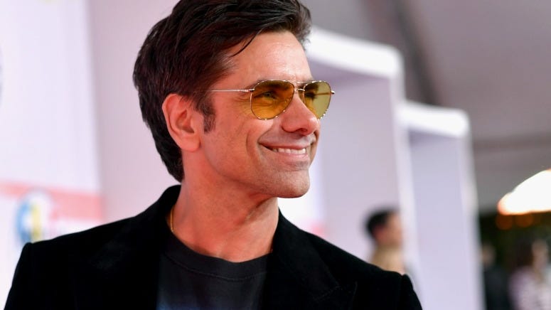 John Stamos Reads Your Sexy Tweets and Explains His 80's Mullet