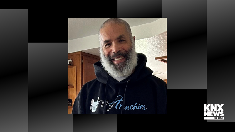 Black man with gray beard wearing hoodie