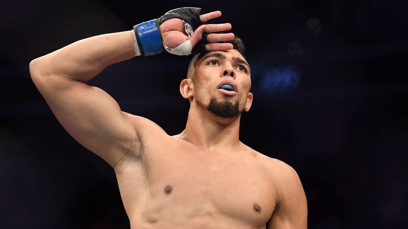 Johnny Walker salutes the crowd after a victory at UFC 235.
