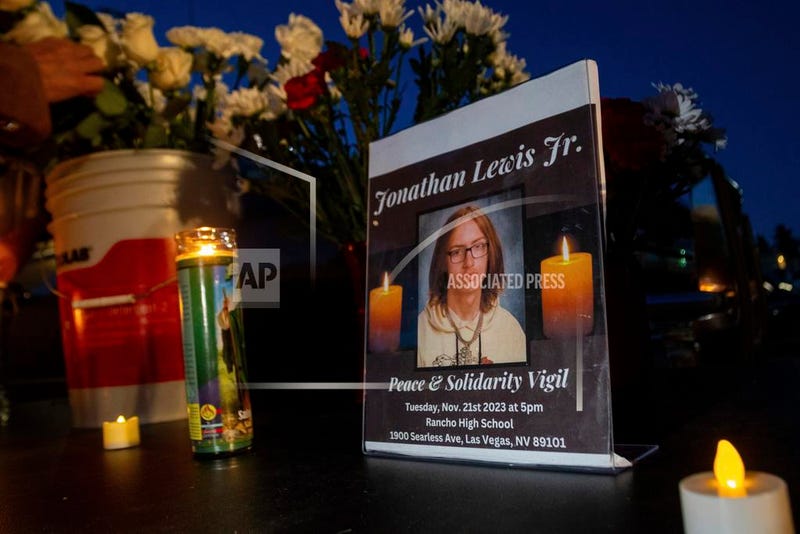 A memorial for Jonathan Lewis Jr. is set up in an alleyway near Rancho High School in eastern Las Vegas, Nov. 21, 2023.