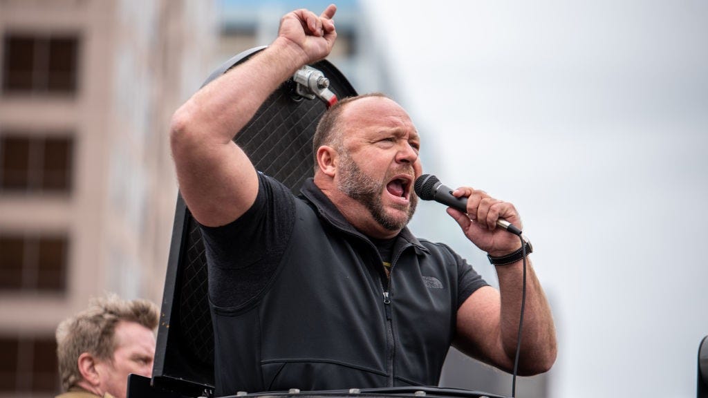 Conspiracist Alex Jones says he's too sick for deposition - then taped his show