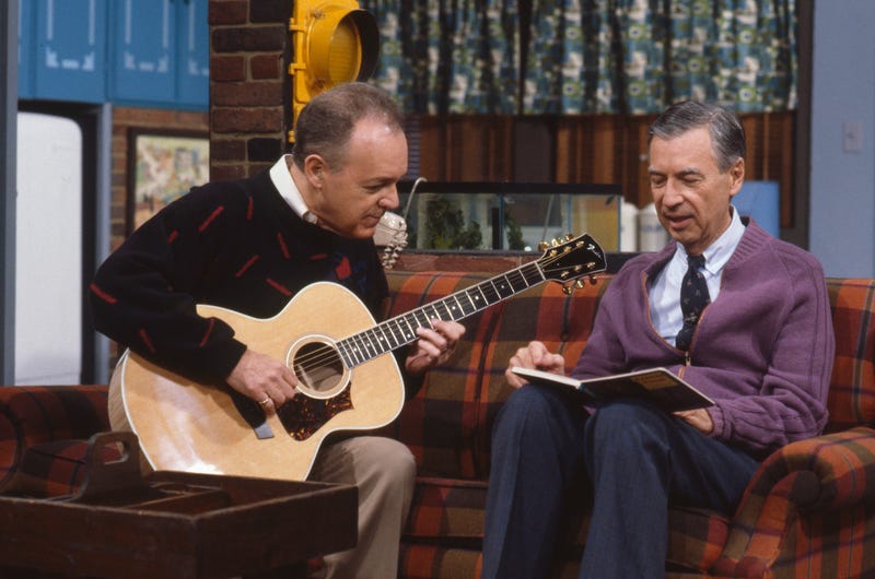 Joe Negri playing guitar with Fred Rodgers