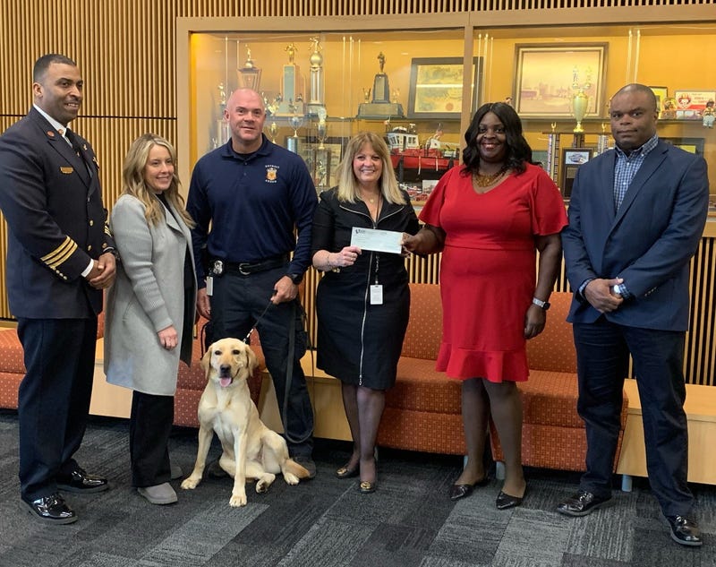 K-9 Cricket and DFD officials