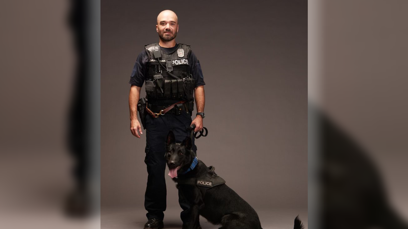 KCOPD officer James Muhlbauer and K9 Champ