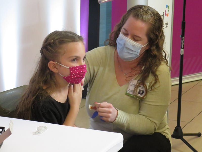 The 5-to-11 year olds who got their initial Pfizer COVID shots just after they were approved returned to Hartford Hospital for their follow-up shots, 11/23/21